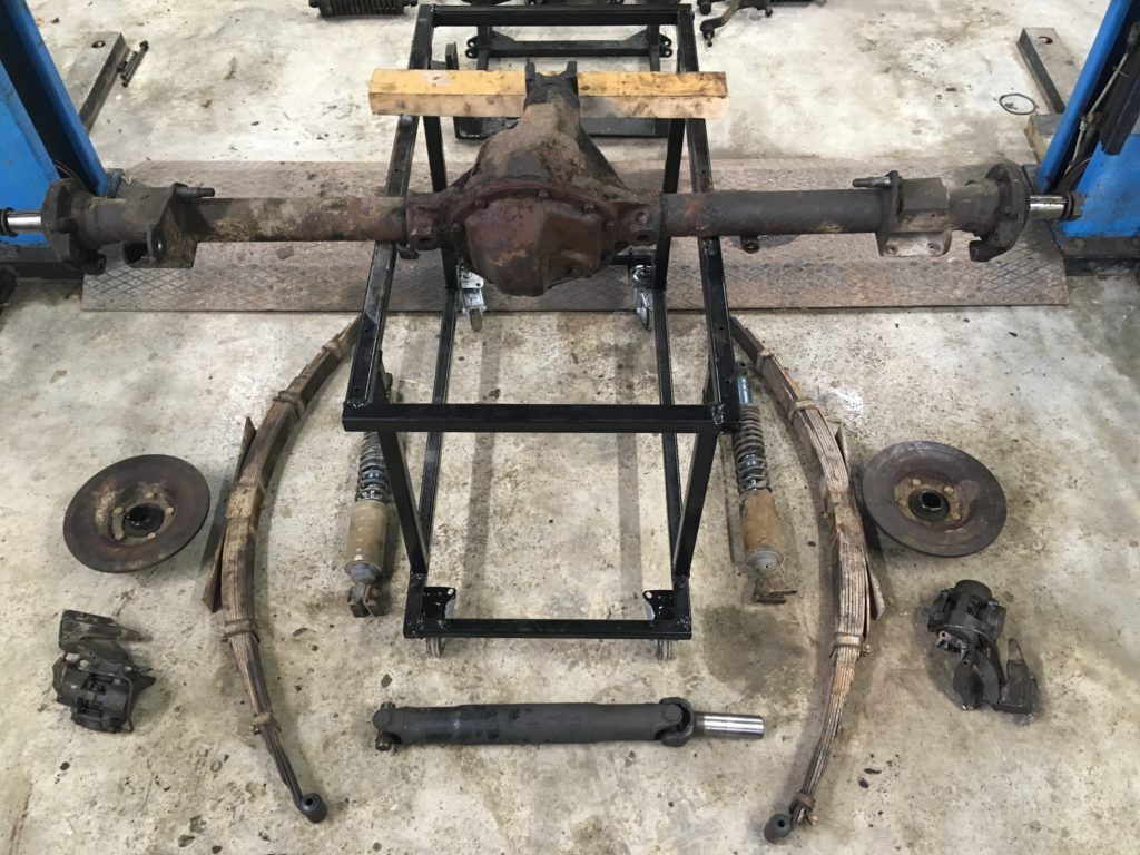Rear suspension and axle stripped